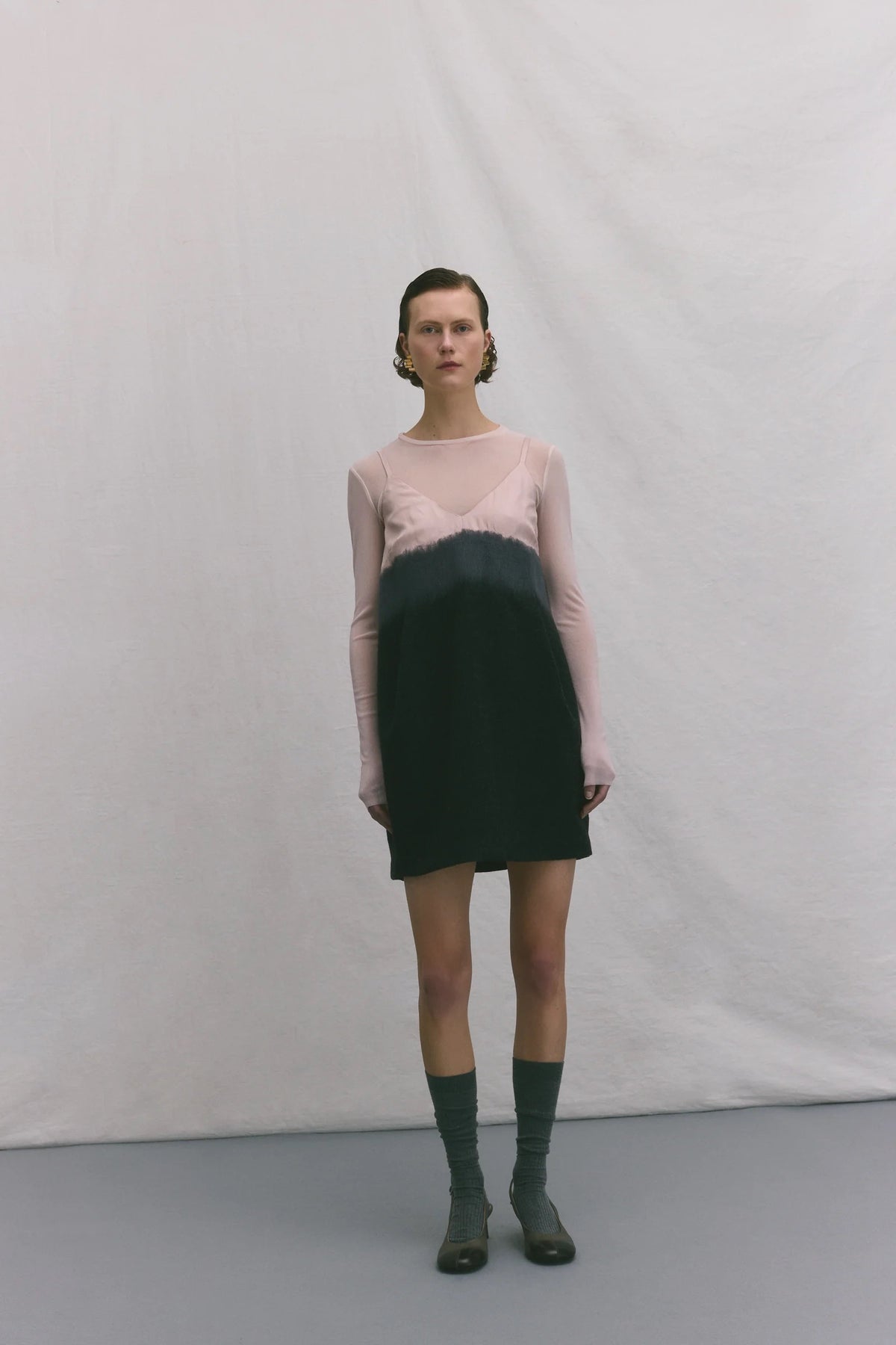 Top girocollo a maniche lunghe in tulle rosa cipria