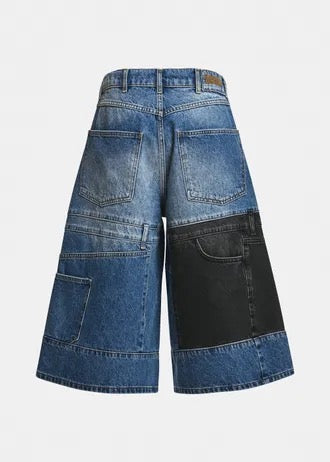 Dark blue and black dual-panel patchwork denim shorts
